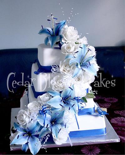 Blue lilies and white rose wedding cake - Cake by ozgirl39