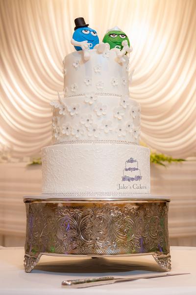 M&M Flower Bling Wedding cake - Cake by Jake's Cakes