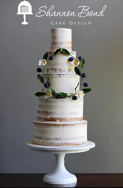 Semi-naked Wedding Cake with Floral Wreath - Cake by Shannon Bond Cake Design