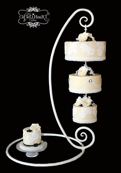 Hanging Wedding Cake - Ivory and Navy - Cake by Emma Waddington - Gifted Heart Cakes