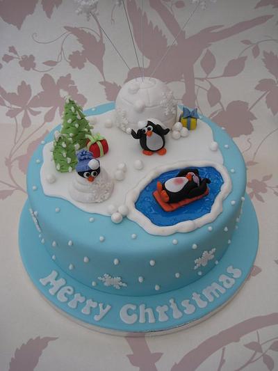 Penguins having fun in the snow cake - Cake by Deborah Cubbon (the4manxies)