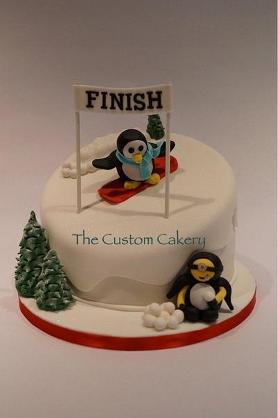Snowboarding penguin with a snowballing minion in disguise! - Cake by The Custom Cakery
