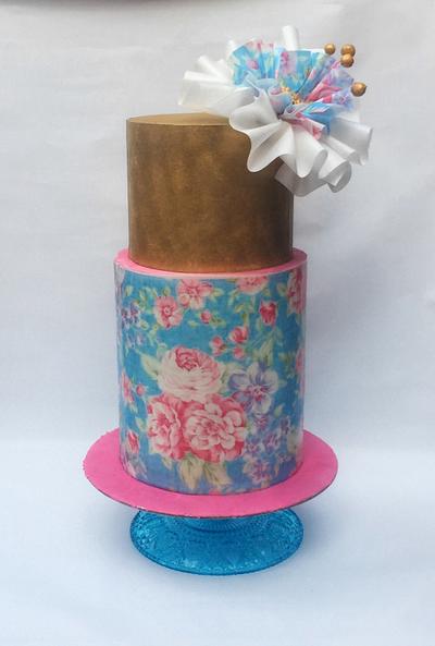 Elegant Pin wheel bow cake. - Cake by Inspired Sweetness