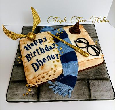 Golden snitch Harry potter cake - Decorated Cake by Rock - CakesDecor