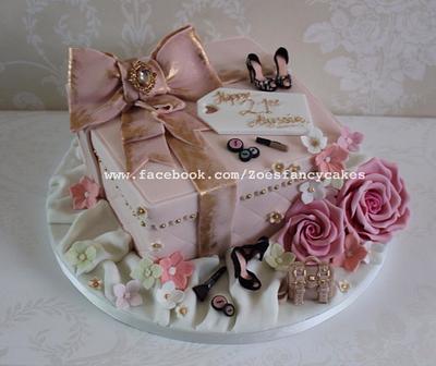 Pink themes present cake including shoes, flowers and mulberry bag - Cake by Zoe's Fancy Cakes