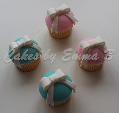 Baby Pink and Blue Bow Cupcakes - Cake by CakesByEmmaB