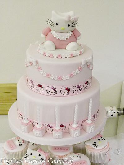 Hello Kitty 2 tier birthday cake and matching cupcakes - Cake by Paula