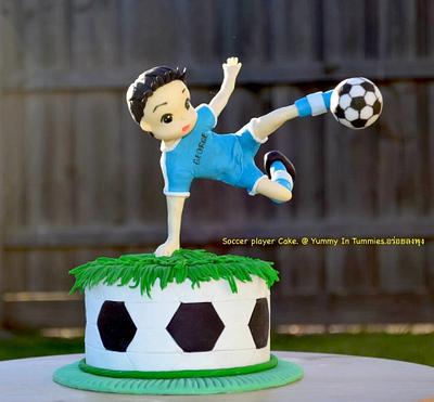Soccer player cake.  - Cake by Yummy In Tummies. 