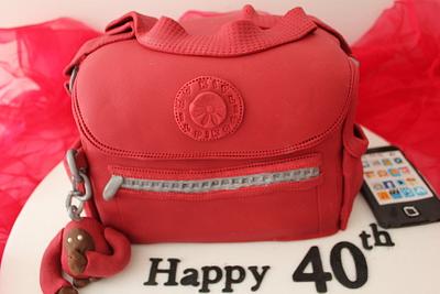 Kipling handbag cake with an ipod - Cake by Cakes o'Licious