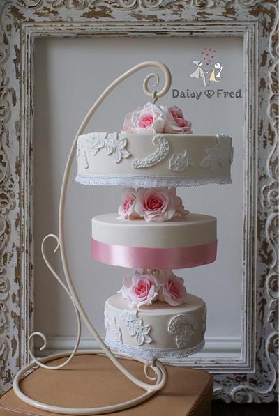 Hanging upside down wedding cake  - Cake by Daisy & Fred