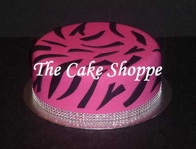 zebra print cake with blind ribbon - Cake by THE CAKE SHOPPE