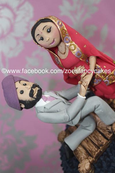 Cake topper ready for a gold wedding cake. - Cake by Zoe's Fancy Cakes