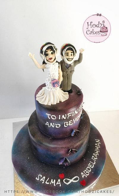 Astronauts & Space themed Engagement Cake👨🏽‍🚀👩🏼‍🚀🦋💜💙💗 - Cake by Hend Taha-HODZI CAKES