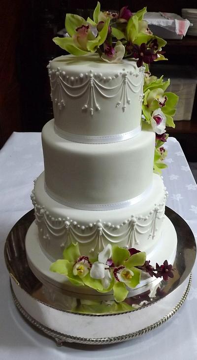 White Pearl Drape & Fresh Orchid Wedding Cake :) x - Cake by Storyteller Cakes