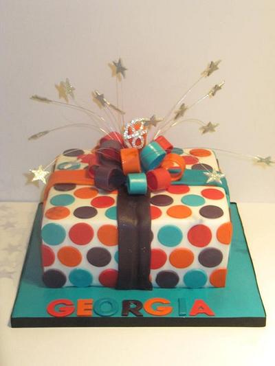 bright bow/spots and stars with a bit off bling  - Cake by d and k creative cakes