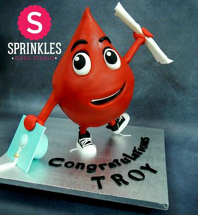 Graduate blood drop - Cake by Sprinkles Cake Studio