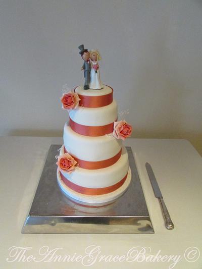 Coral Themed wedding cake with colour graduating roses - Cake by The Annie Grace Bakery