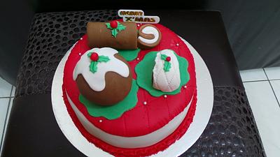 Christmas goodies on a cake - Cake by JudeCreations