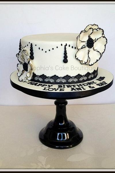 Cream and black simplicity.  - Cake by Sophia's Cake Boutique