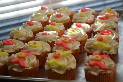 Pink and yellow bow cupcakes  - Cake by Cakesbylala