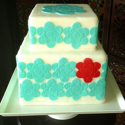 Aqua flowers and one red flower - Cake by The Vagabond Baker