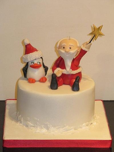 cheeky penguin and santa  - Cake by d and k creative cakes