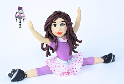 Girl doing a split topper  - Cake by Color Drama Cakes