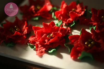 Really easy fondant poinsetta toppers! - Cake by Shawna McGreevy