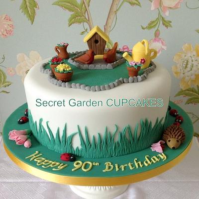 Garden Theme Cake with birdhouse, robins, hedgehog, freesias, daffodils, ladybirds and more - Cake by Siyana Sibson