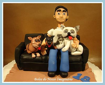 Boy sitting on the couch with his dogs - Cake by BolosdoNossoImaginário