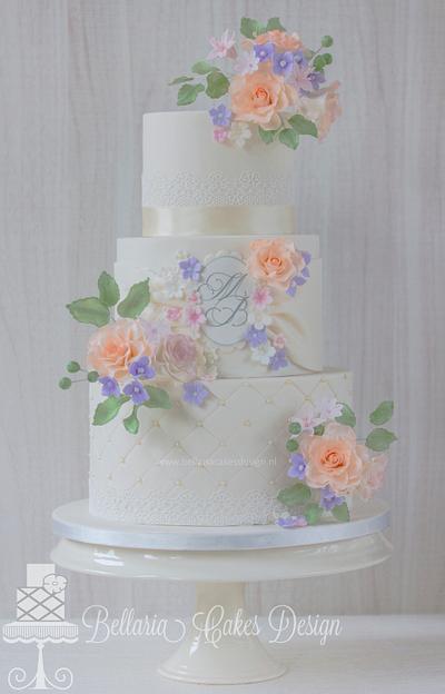 Ivory wedding cake with pastel flowers - Cake by Bellaria Cake Design 