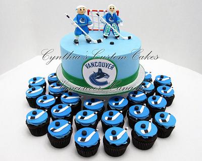 Canucks - Cake by Cynthia Jones