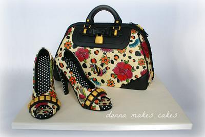 Iron Fist bag and shoes cake - CI NEC entry - Cake by Donna Marsden