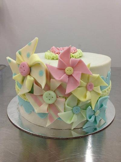 Pin Wheel Modelling Chocolate covered Cake - Cake by CakeyBakey Boutique
