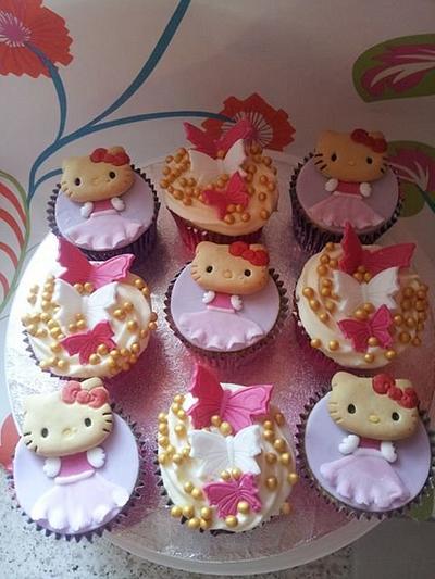 hello kitty cupcakes - Cake by Sweetlycakes