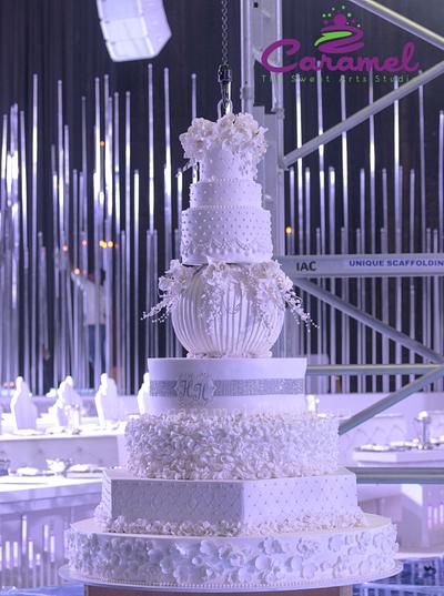 Halo Hanging Wedding Cake - Cake by Caramel Doha