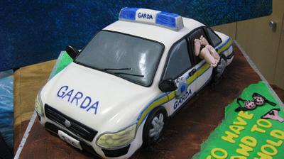 Garda car hen party cake - Cake by Novel-T Cakes