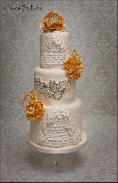 All that sparks gold floral cake - Cake by Cakes by Nina Camberley