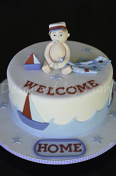 Welcome home baby. - Cake by designed by mani