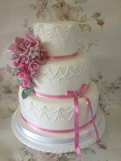 Pink flower spray with hand piped detail - Cake by Laura Woodall