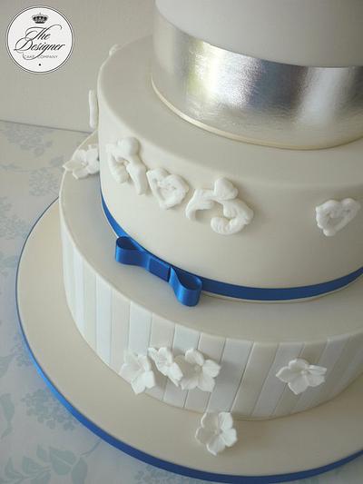 Ivory & royal blue wedding cake - Cake by Isabelle Bambridge