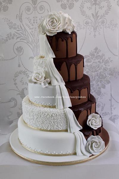 Dripping chocolate wedding cake half and half - Cake by Zoe's Fancy Cakes