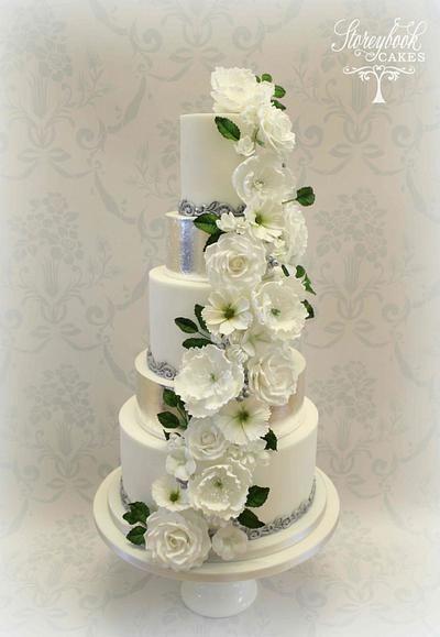 White floral cascade wedding cake - Cake by StoreybookCakesUK