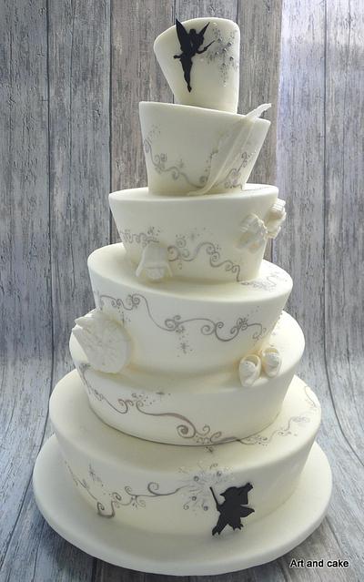 Wedding cake topsy turvy.. Tinkerbell Vs star Wars - Cake by marja