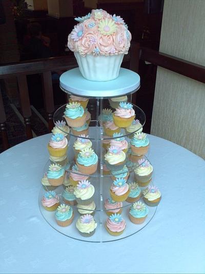 Pastel giant cupcake wedding tower - Cake by FancyBakes