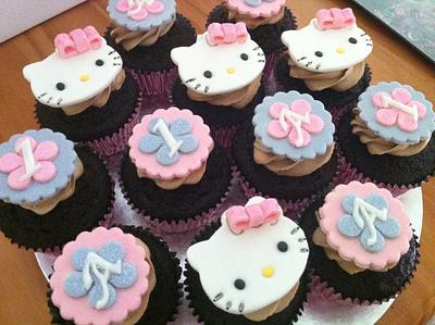 Hello Kitty Birthday Cake with matching cupcakes - Cake by CakeIndulgence