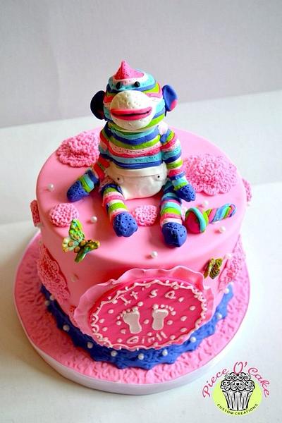 Rainbow sock monkey baby shower  - Cake by Piece O'Cake 