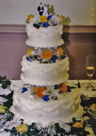 buttercream wedding cake with roses, lilies, delphinium - Cake by Nancys Fancys Cakes & Catering (Nancy Goolsby)