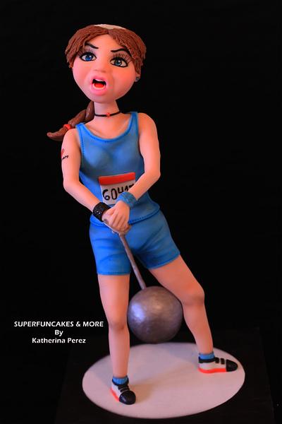 Sport Cakes for Peace Collaboration-Hammer throw girl  - Cake by Super Fun Cakes & More (Katherina Perez)