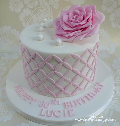 Pink Rose with quaterfoil pattern cake - Cake by Jip's Cakes